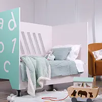 Cot converts to toddler bed